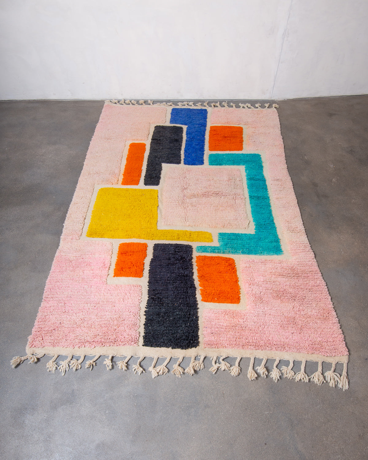 Modern, designer, handcrafted Berber rug from Morocco. Beniourain carpet with beautiful colours and patterns and fluffy wool texture.